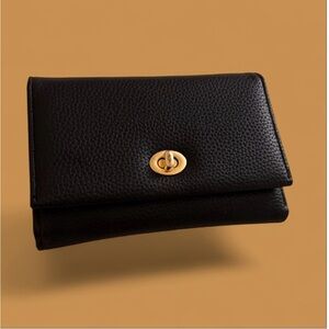 Black pebbled leather latch key wallet